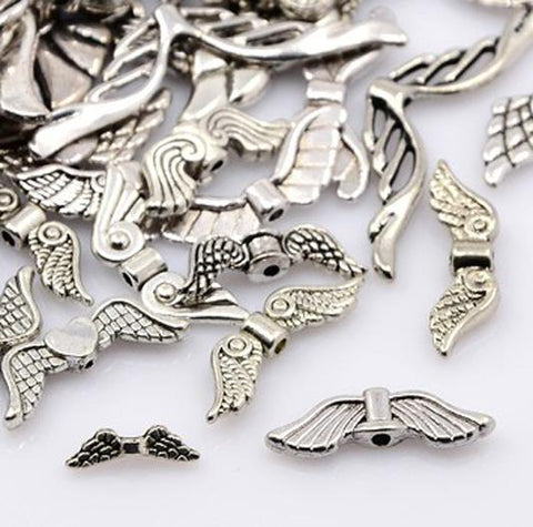 TOP QUALITY ASSORTED TIBETAN SILVER ANGEL WING SPACER BEADS 50gram BAGS TS41